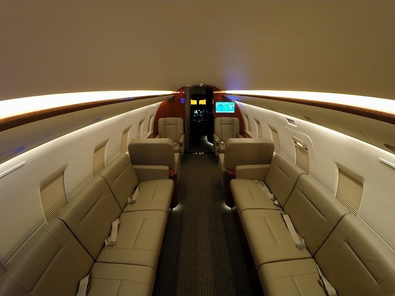 Private jet cabin looking forward through the seat rows on a Philadelphia, Pennsylvania charter