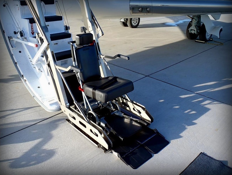 Wheelchair lift platform at the airstair door of a private jet in Philadelphia, Pennsylvania
